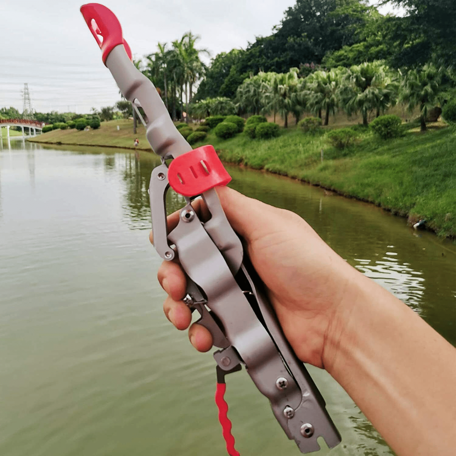 Spring-loaded fishing rod holder : r/toolgifs